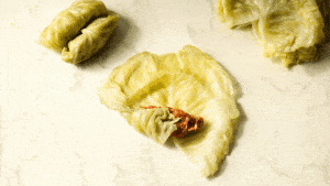 gif/video of hands rolling the stuffed cabbage rolls